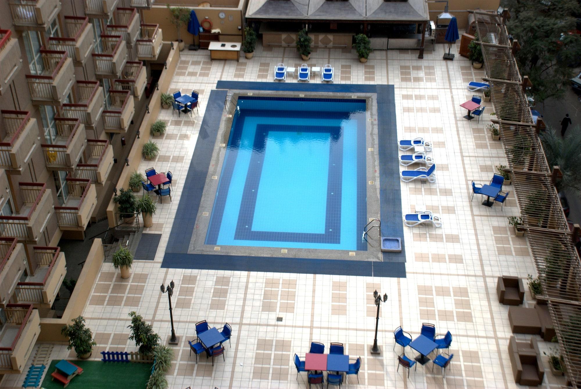 โรงแรมซาเฟอไคโร Giza ภายนอก รูปภาพ The pool at the hotel